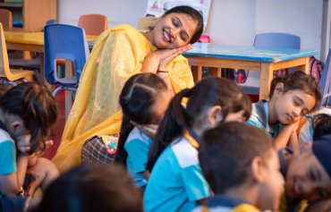 Children enjoying language and storytelling at Neevalay