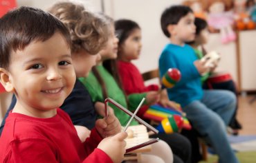 Children enjoying music and movement at Neevalay