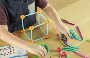 Children exploring STEM activities at Neevalay
